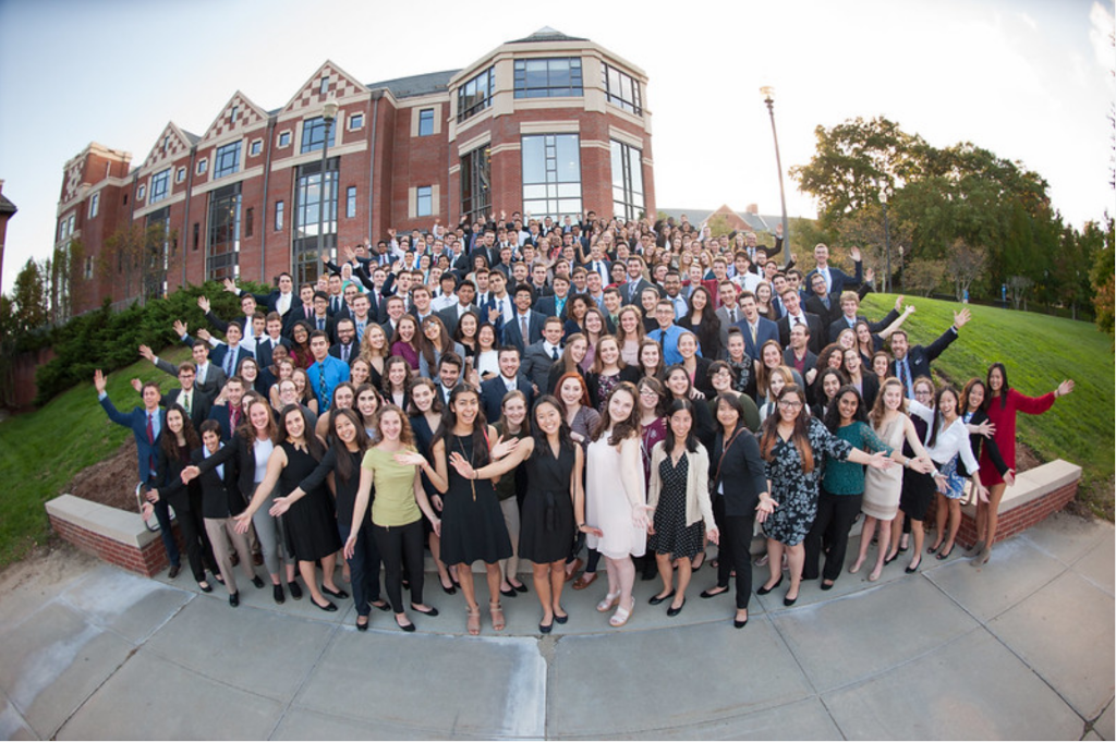 student scholarship recipients posing in front of rome ballroom building
